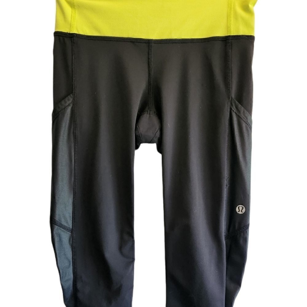 ‎Lululemon Chase Me Black and Lime Green Capri Leggings Size 2